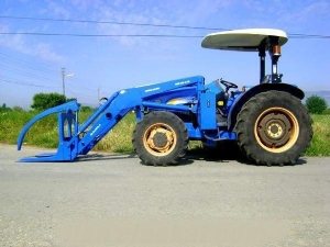 TT 55 New Holland traktr e tomruk ykleyici